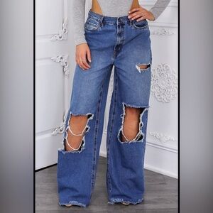 16. Women's Distressed Blue Jeans
